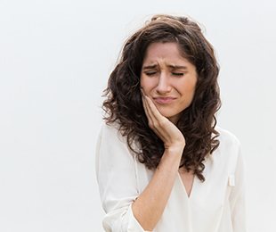 Illustration showing infected tissue around a dental implant