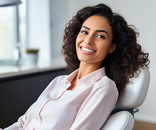 Woman grimacing because of mouth pain